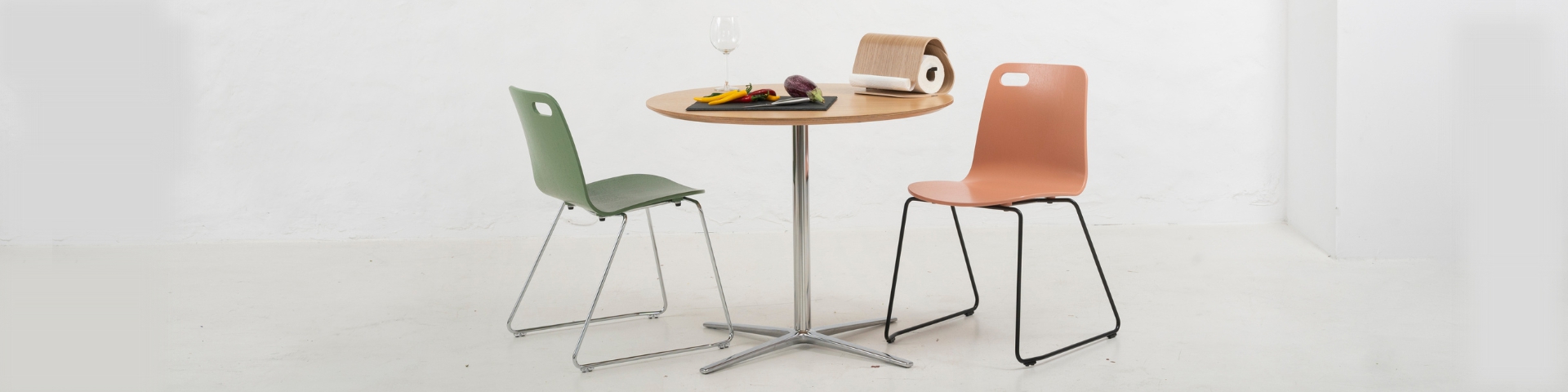 Mothership tea table with metal base—bistro‑style simplicity with sleek plywood top and slender metal support.