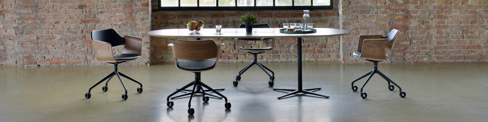 Plydesign's PARTNERSHIP Conference Table: Classic aesthetics, modern functionality, and built-in electrical outlets.
